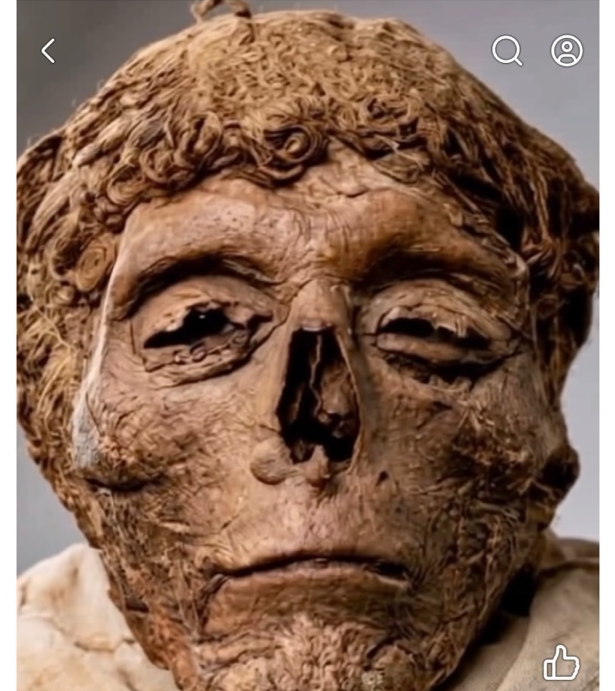 Ancient face before restoration